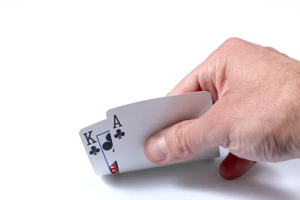 Beyaz Adamın Elini Çiçek Poker Kartları Beyaz Arka Plan Üzerinde — Stok fotoğraf