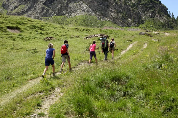 group of hikers on italian alps