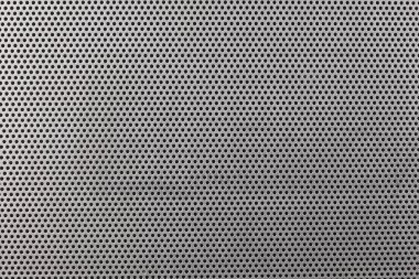 close up on a mettalic texture with small holes clipart