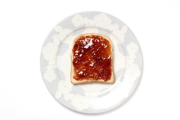 Φέτα Φρυγανισμένου Ψωμιού Μαρμελάδα Φράουλα Πιάτο Που Απομονώνεται Λευκό Φόντο — Φωτογραφία Αρχείου