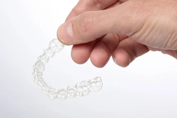 Man Hand Hold Teeth Brace Aligner Isolated White Background Copy — Stock Photo, Image