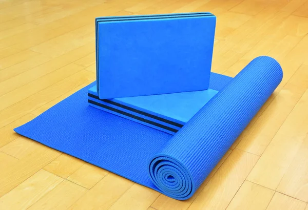 Blue exercise Mat and blocks for Yoga or Pilates