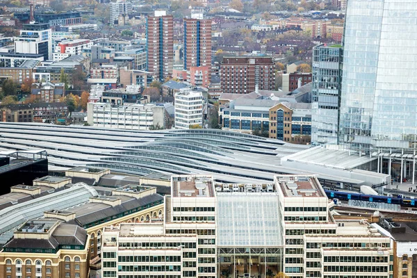 Aerial cityscape view of modern London Bridge train station