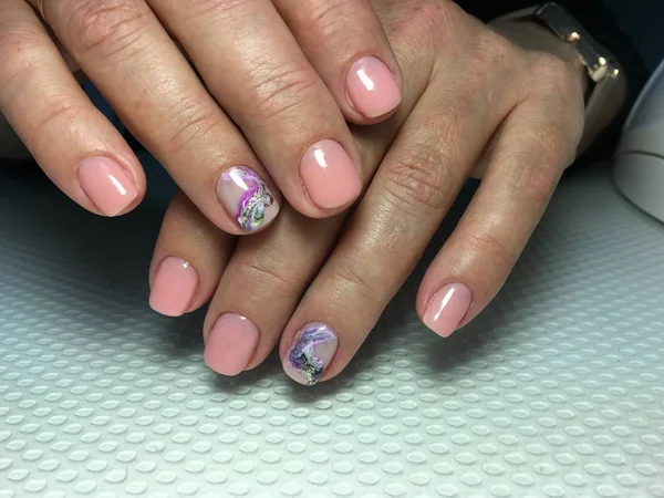 Trendy and stylish natural beige manicure with color design — 스톡 사진