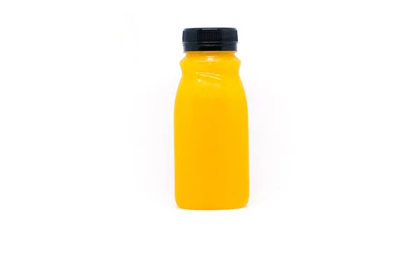 Pomerančový džus v lahvičce — Stock fotografie