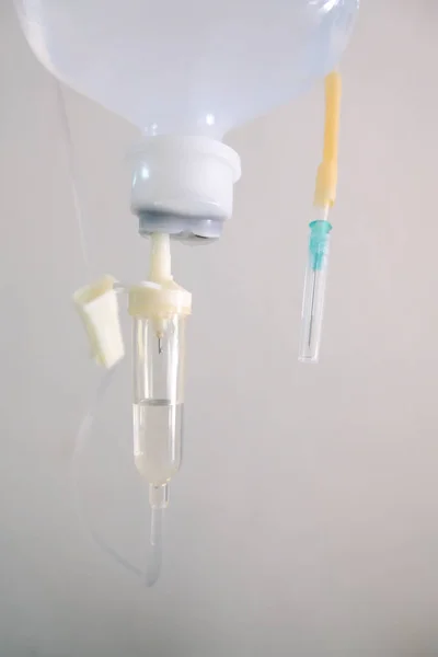 IV tube and Saline — Stock Photo, Image