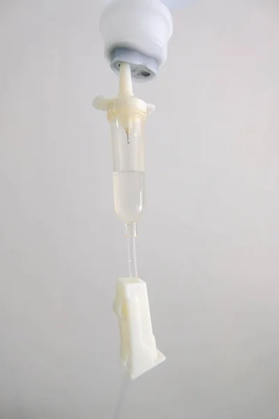 IV tube and Saline — Stock Photo, Image