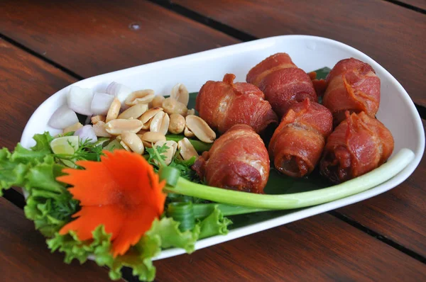 Bacon Wrapped Fermented Thai Pork — Stock Photo, Image