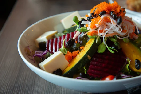 japanese salad with crab stick and prawn roe