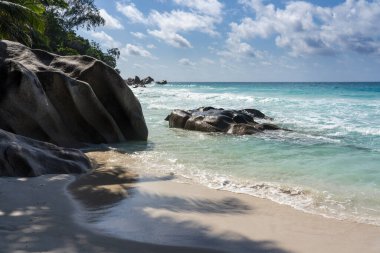 Anse Georgette beach in Praslin Island Seychelles  clipart
