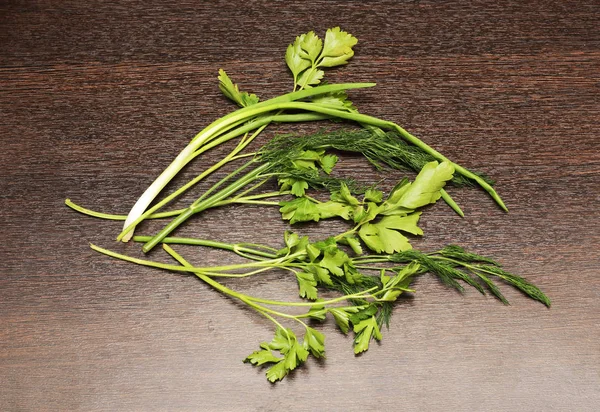 Green sprigs of dill, parsley and onions. — Stock Photo, Image