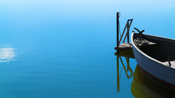 tranquil scenery with moored rowing boat in calm water and copy space