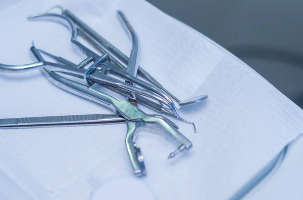 Dental instruments on the table in a dental office.