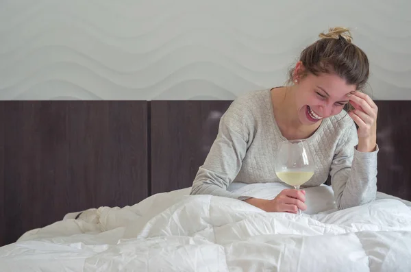 Young Blonde Woman Laughing Bed Glass Wine Hand Waking Happy — Stock Photo, Image