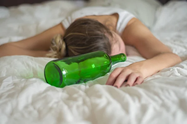 Great Concept Alcohol Abuse Young Woman Blond Hair Fainted Bed — Stock Photo, Image