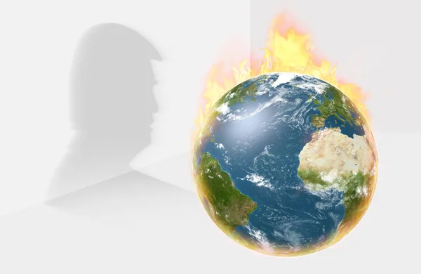 Burning Earth Globe with Trump Silhouette in background.