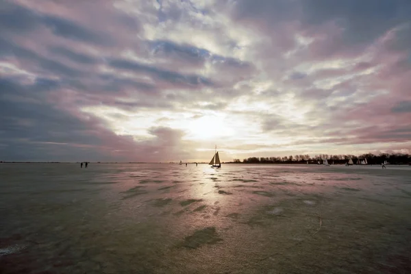 Ice sailing on the Gouwzee in the Netherlands at sunset — Stock Photo, Image
