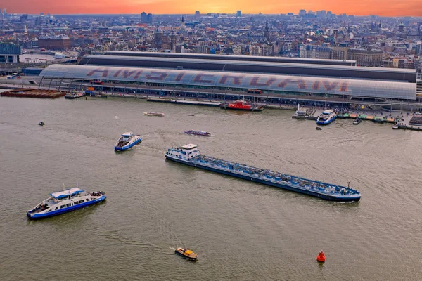 Aerial view from the harbor in Amsterdam Netherlands at sunset — Stock Photo, Image