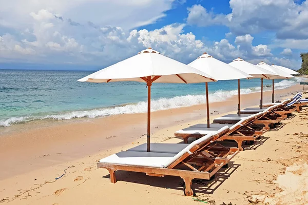 Beach umbrellas at Thomas beach on Bali Indonesia — Stock Photo, Image