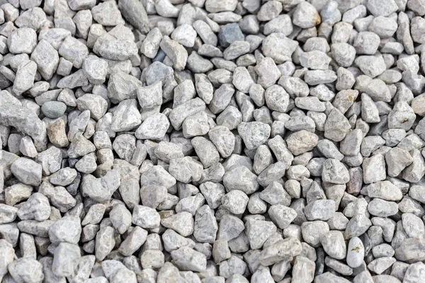 background or texture, white gravel, flat lay of rocks