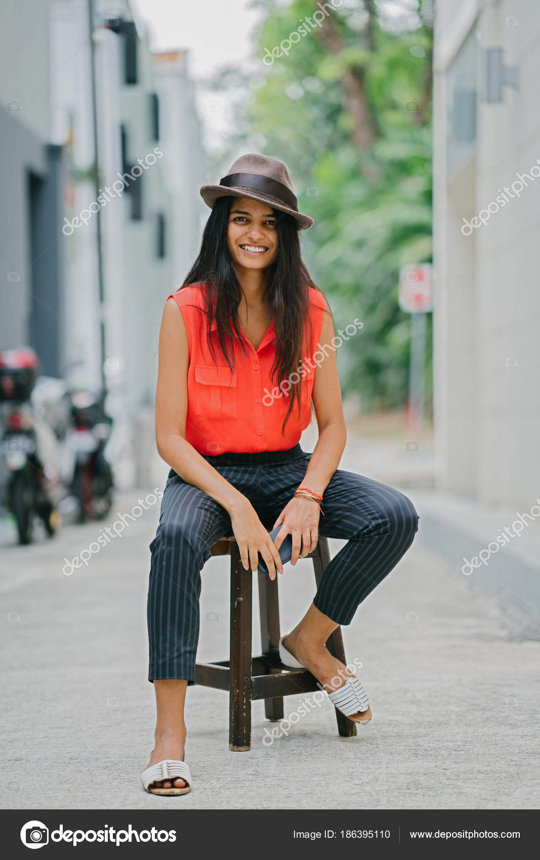 Fashionable Young Asian Model Woman in Fashion Wearing Casual Red