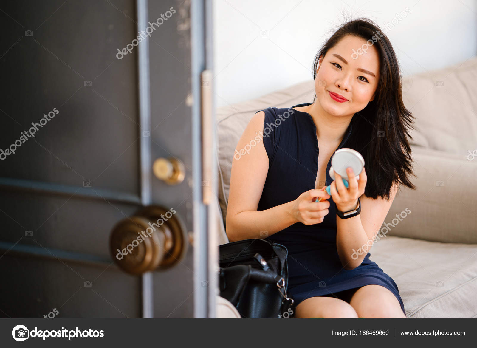 Young Chinese Asian Woman Applying Makeup Couch Day Next Door