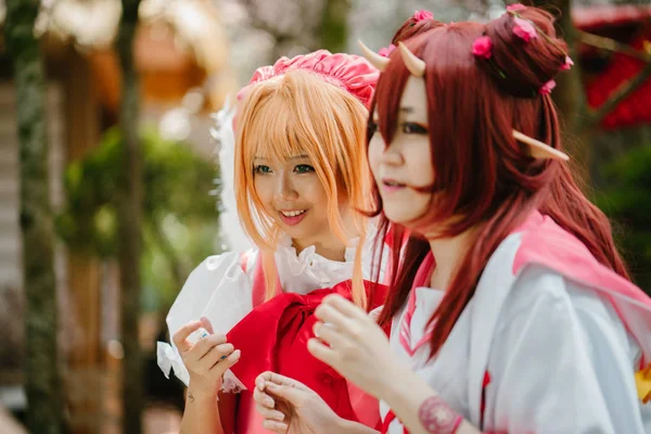 stock image Singapore, March 2018: Young cosplayers dress up as Japanese Anime and Manga characters for Sakuta Matsuri in the Flower Dome within Gardens by the Bay in Singapore.