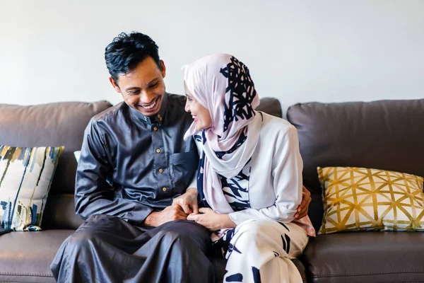 Portrait Of A Muslim Malay Couple At Home During The Muslim Festival Of Hari Raya In Singapore Asia They Are Sitting On Their Home Couch Flat Wife Stock Photo 195399536