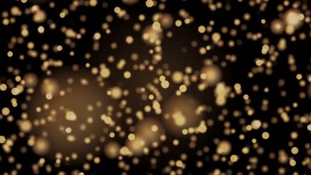 金色に光輝く粒子のボケ味 — ストック動画
