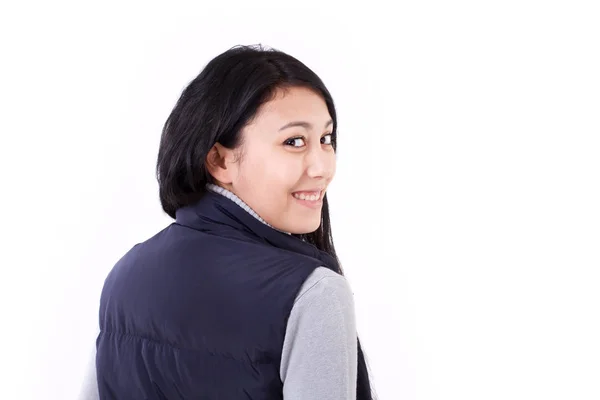 Happy, smiling asian-caucasian woman looking back — Stock Photo, Image