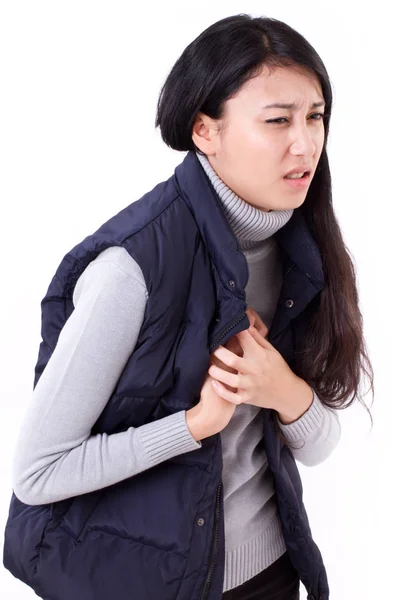 Mujer que sufre de un ataque al corazón o acidez estomacal — Foto de Stock