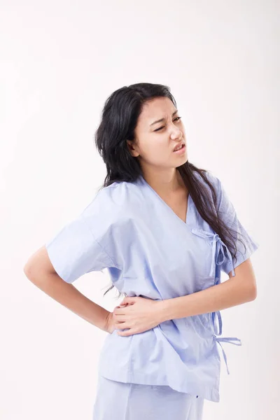 Mujer sufriendo de dolor de espalda — Foto de Stock