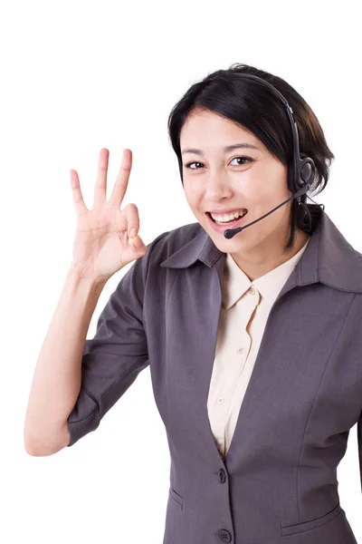 Счастливая деловая женщина, телефон помощи, персонал по обслуживанию клиентов показывает себя хорошо — стоковое фото