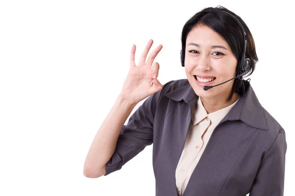 Счастливая деловая женщина, телефон помощи, персонал по обслуживанию клиентов показывает себя хорошо — стоковое фото