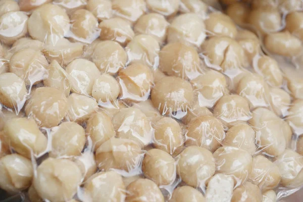 Macadamia-Nüsse in Plastikverpackung — Stockfoto