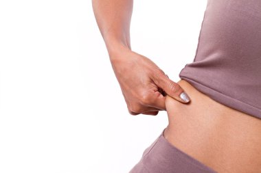 aşırı karın yağ, tutan kadının el izole