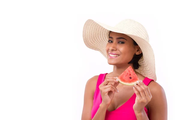 Happy woman holding watermelon, looking and smiling to you — Stock Photo, Image