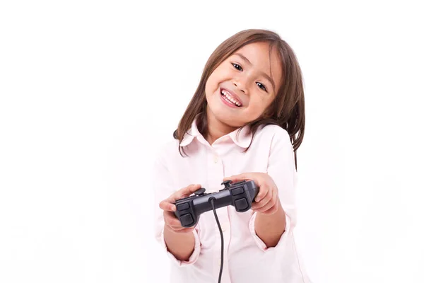 Heureuse petite fille gamer jouer jeu vidéo — Photo