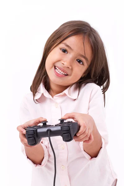 Happy little girl gamer playing video game — Stock Photo, Image