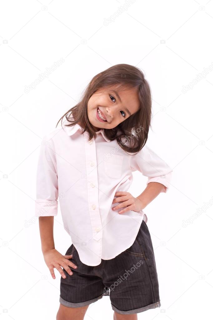 happy, smiling young little girl standing
