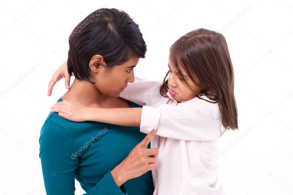 mother teaching discipline to her daughter