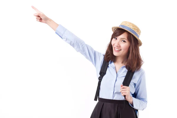 Felice donna asiatica viaggiatore indicando, studio isolato di donna — Foto Stock