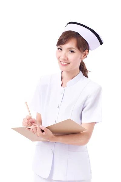 Boldog, pozitív nővér az orvosi dokumentációba, néz rád — Stock Fotó