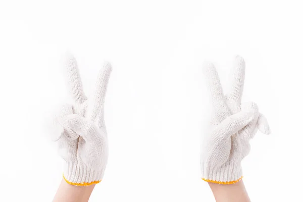 Pracownik Dwuosobowy ręce skierowaną w górę dwoma palcami, z rękawic bawełnianych — Zdjęcie stockowe