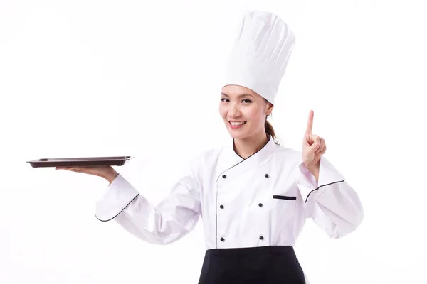 Feliz, sorrindo, chef feminino positivo apontando um dedo — Fotografia de Stock