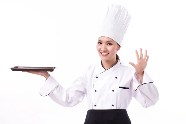 Feliz, sorrindo, chef feminino positivo apontando cinco dedos — Fotografia de Stock