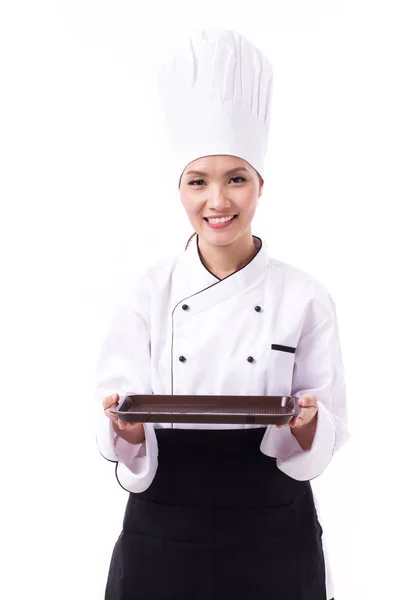 Felice, sorridente, mano positiva chef femminile tenendo vassoio cibo vuoto — Foto Stock