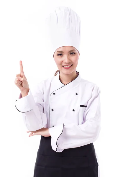 Feliz, sorrindo, chef feminino positivo apontando um dedo — Fotografia de Stock