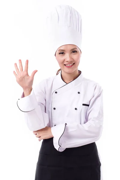 Feliz, sorrindo, chef feminino positivo apontando cinco dedos — Fotografia de Stock