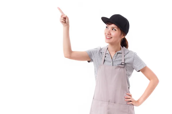 Feliz, trabajadora sonriente apuntando con el dedo hacia arriba — Foto de Stock
